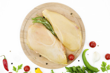 Raw chicken parts with different ingredients