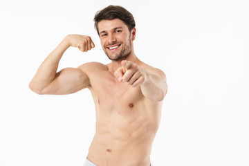 Obraz premium Portrait of a handsome young shirtless sportsman