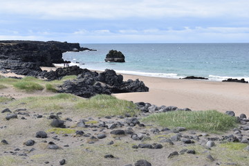 Beautiful beach with black sand at Snaefellsjökull National Park at Snaefellsnes Peninsula in...