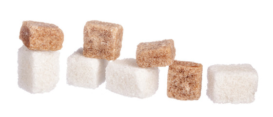 White refined sugar and brown unrefined sugar cubes