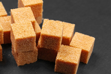 Rock sugar on dark background close up