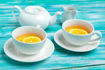healthy herbal tea over blue background