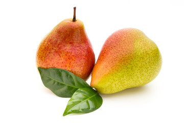Fresh bio pear with leaves on isolated white background.