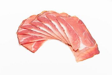Hamon sliced on white background. Spanisch traditional meat.