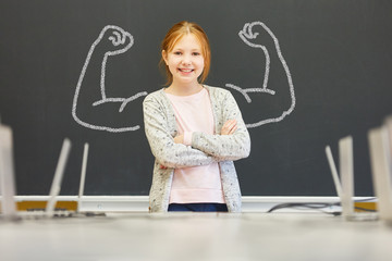 Strong girl with self-confidence in school