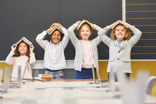 Children are fooling around with books