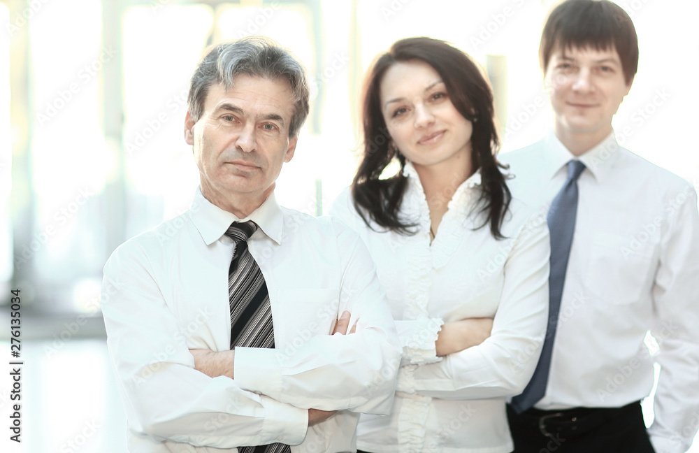 Wall mural confident business team in the background of the office