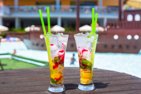 Cocktail glasses at the pool on summer holidays
