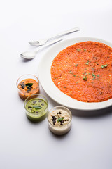 Tomato Dosa is a unique South Indian Dosa recipe served with chutney and sambar