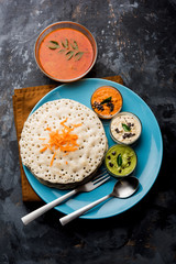 Set Dosa / Oothappam style dosa is a popular south Indian food served with sambar and chutney, selective focus