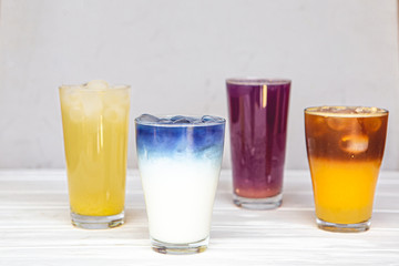 quench the summer thirst with the help of rich, colorful refreshing cocktails with fruits, vegetables, coffee, milk plant, which photographed on a white background