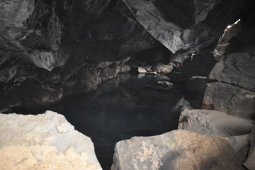 Fototapeta na wymiar Beautiful blue grotto Grotagja Cave in Myvatn, Iceland