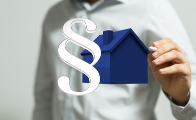law house contract in hand