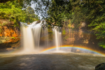 Here is the paradise on the world.The waterfall and beautiful perfect rainbow.Natural will always comfort you and make you feel comfortable.Large trees help this pic feel naturally, rainy season