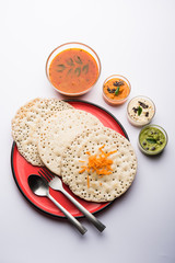 Set Dosa / Oothappam style dosa is a popular south Indian food served with sambar and chutney, selective focus