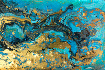 Fototapeta na wymiar Blue and gold marbling pattern. Golden powder marble liquid texture.