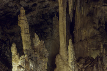 stalagnate column and stalagmites in the Large Azish cave of Adygea