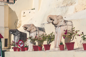 Statues of elephants on the way to Palace City Complex in Udaipur, India
