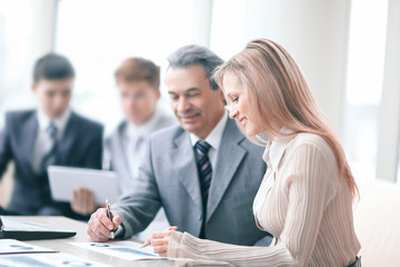 businessman and assistant in the workplace in the office