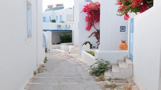 Walking in Naousa street on Paros island, Greece