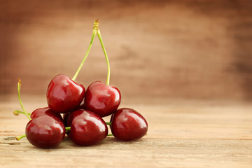 Sweet cherry closed up on wooden table