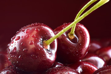 Sweet cherry in water dropsclosed up food background