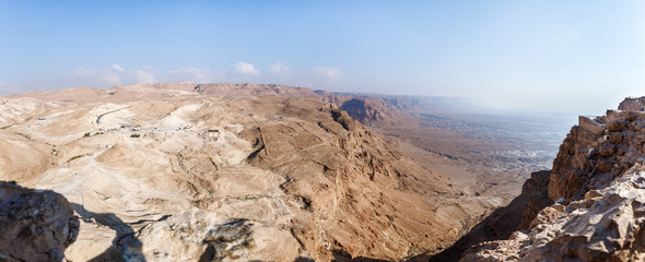 Morning view from ruined Masada fortress to the Judean desert in Israel