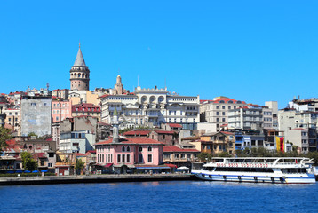 View from water on Galata Tower and Beyoglu district, Istanbul, Turkey