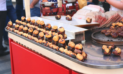 Traditional turkish fast food - roasted chestnuts