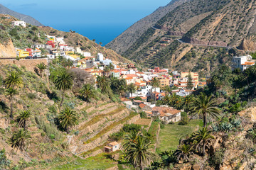 The valley of Vallehermoso, with terraced fields, date palms , agricultural economics, tourism and...