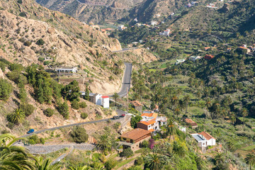 The valley of Vallehermoso, with terraced fields, date palms , agricultural economics, tourism and...