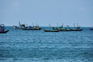 Naklejka na ściany i meble pier and basket boats in asian fishing village