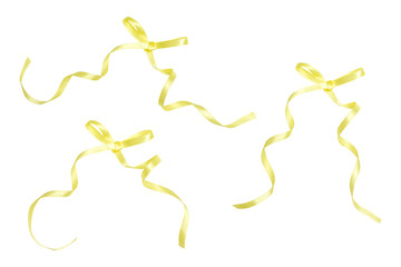 Yellow ribbon tied in a bow isolated on white background.