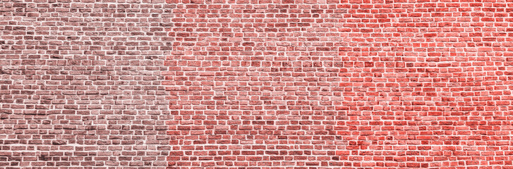 Brick wall, wide panorama of bright red masonry. Wall with small Bricks. Modern wallpaper design for web or graphic art projects. Abstract template or mock up.