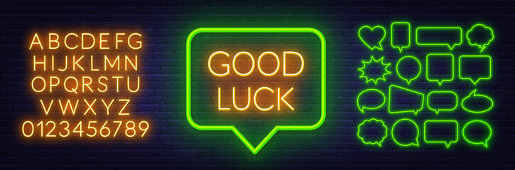 Neon sign good luck in speech bubble frame on dark background. Set of neon speech bubbles and the alphabet on a dark background.