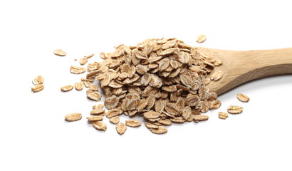 Spelta flakes, rye grain cereal for breakfast in wooden spoon isolated on white background