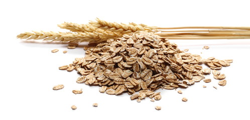 Spelta grain, ear and flakes for breakfast isolated on white background