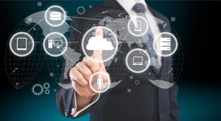 Businessman and internet and virtual reality concept - businessman pressing button on virtual...
