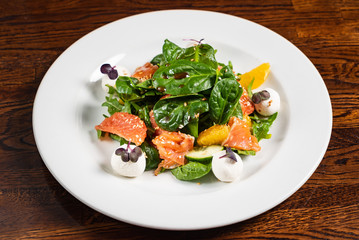 caesar salad with salmon fish