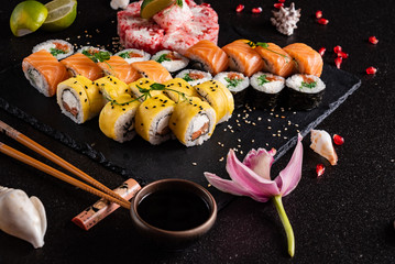 sushi on the black background