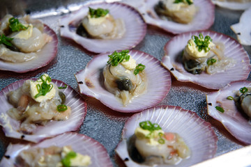 Shellfish, which is seafood on a white plate