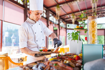 cooking seafood in a restaurant.