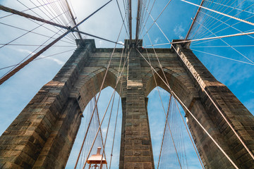 Brooklyn Bridge in New York City, Low Angle View, Bright Sky Background