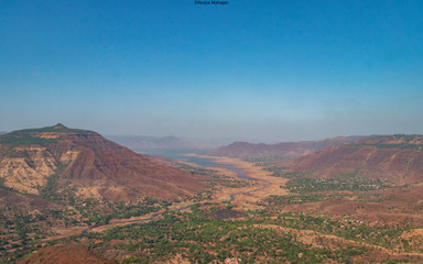 Fototapeta premium An almost dried up river amidst the mountains.