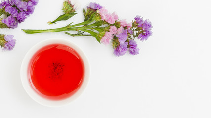 Top view teacup with flowers