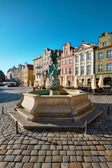 Colorful renaissance facades of old buildings on the Maket square in Poznan, Poland © tilialucida