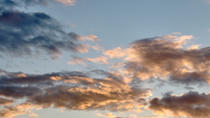 clouds in delicate pink at sunset. wallpapers