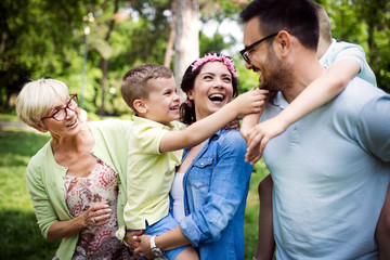 Family picnic outdoors togetherness relaxation happiness concept