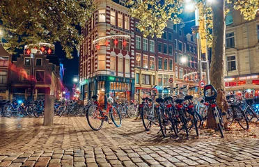 Fotobehang Amsterdam at night, the Netherlands. © badahos