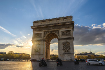 Paris France city skyline sunset at Arc de Triomphe and Champs Elysees